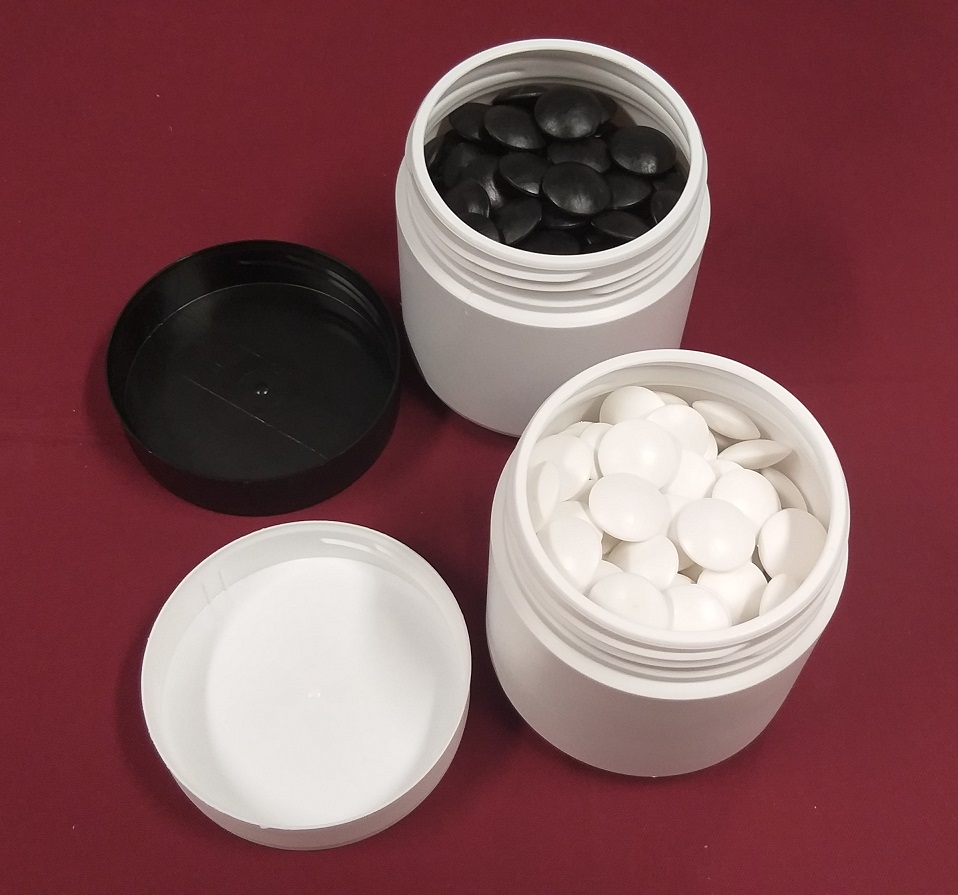 Cylinder shaped plastic go containers with plastic stones