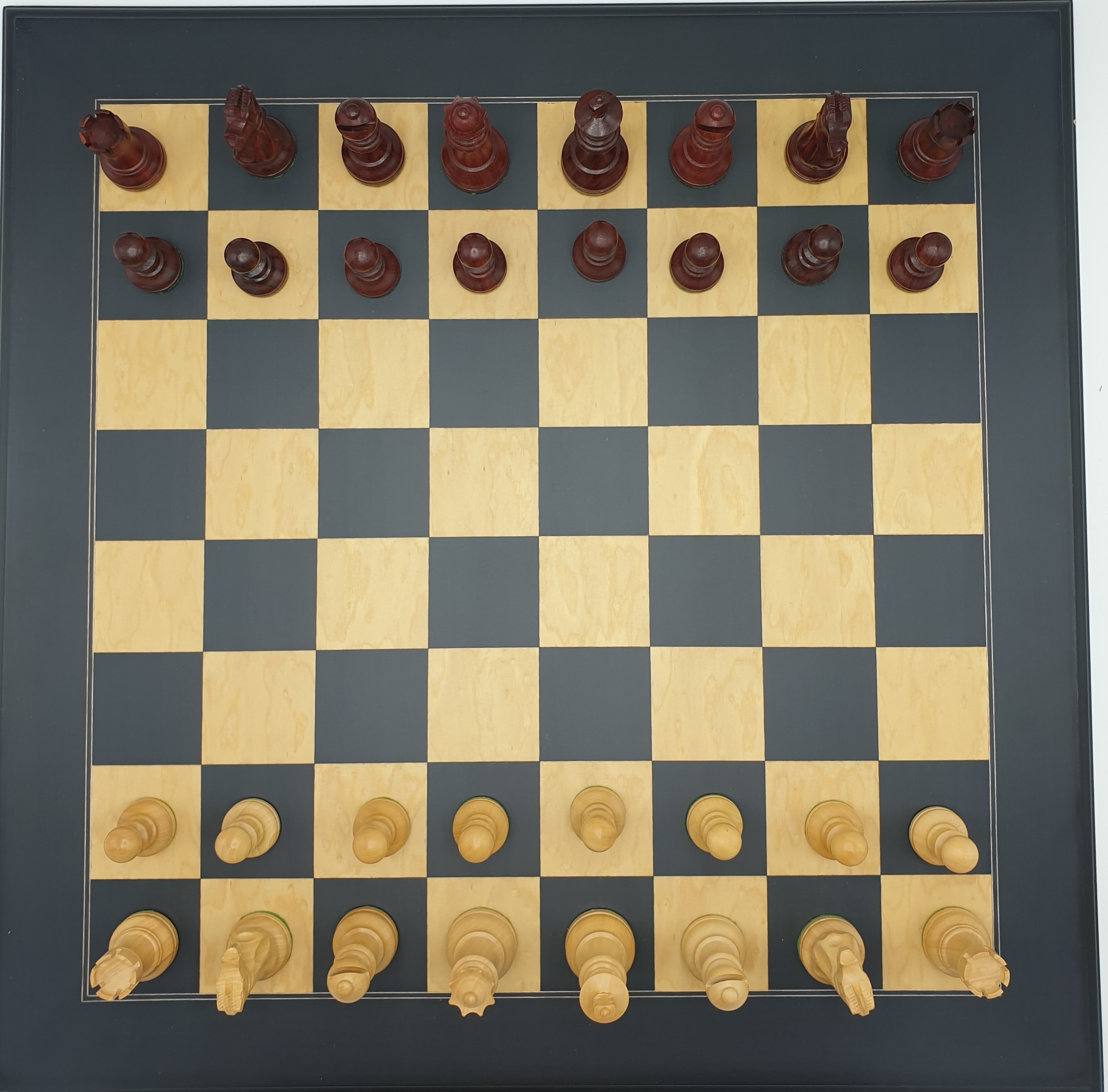 Anigre board with red stained pieces
