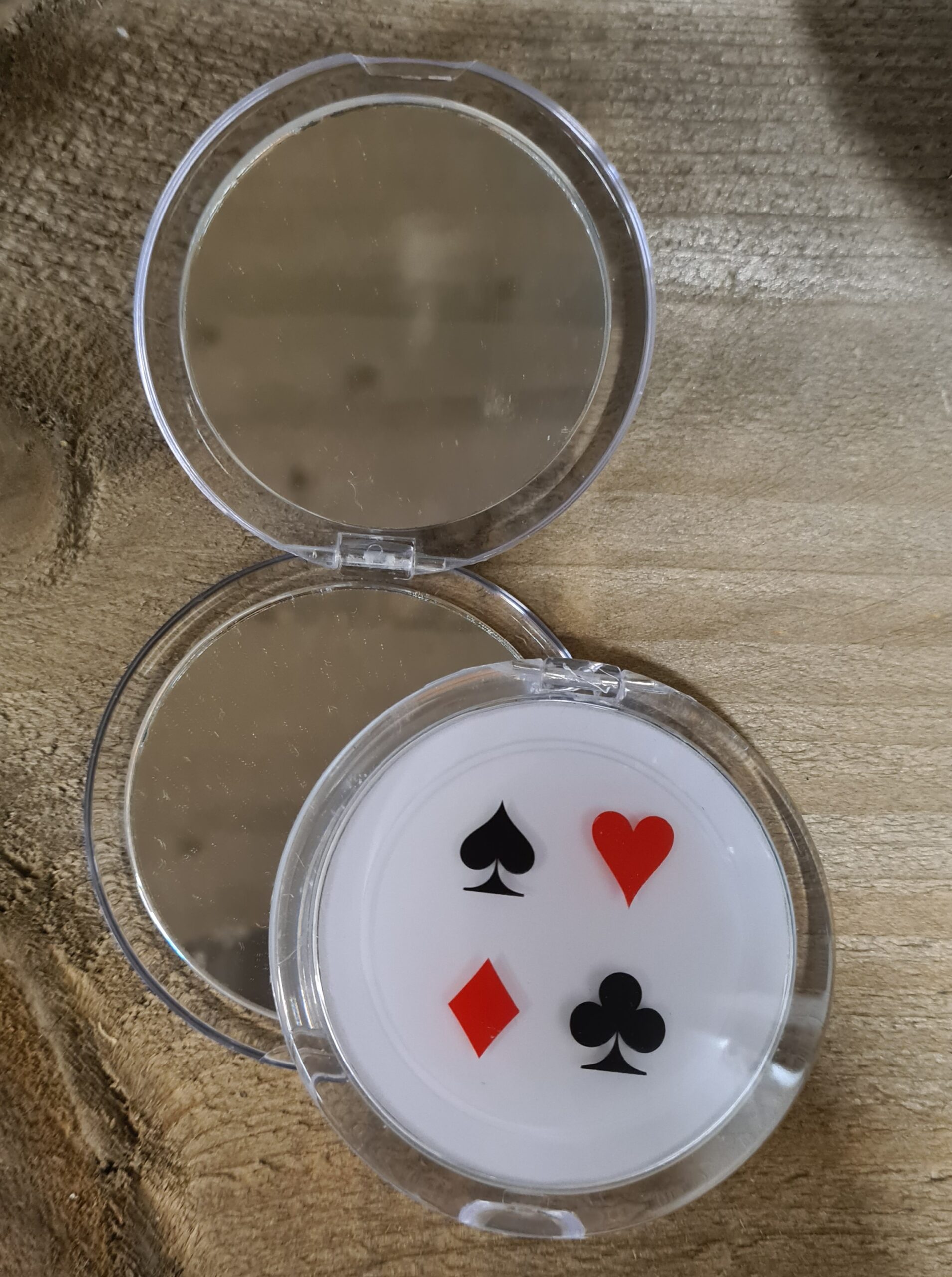 Handtas spiegeltje met kaartsymbolen