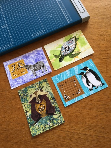 Set of 10 Go Postcards by Murugandi