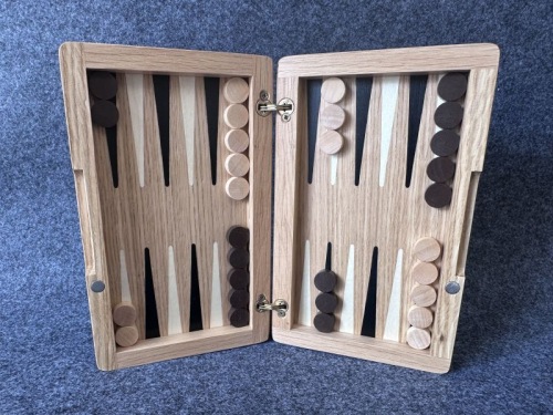 Backgammon reiscassette, Rozeneik